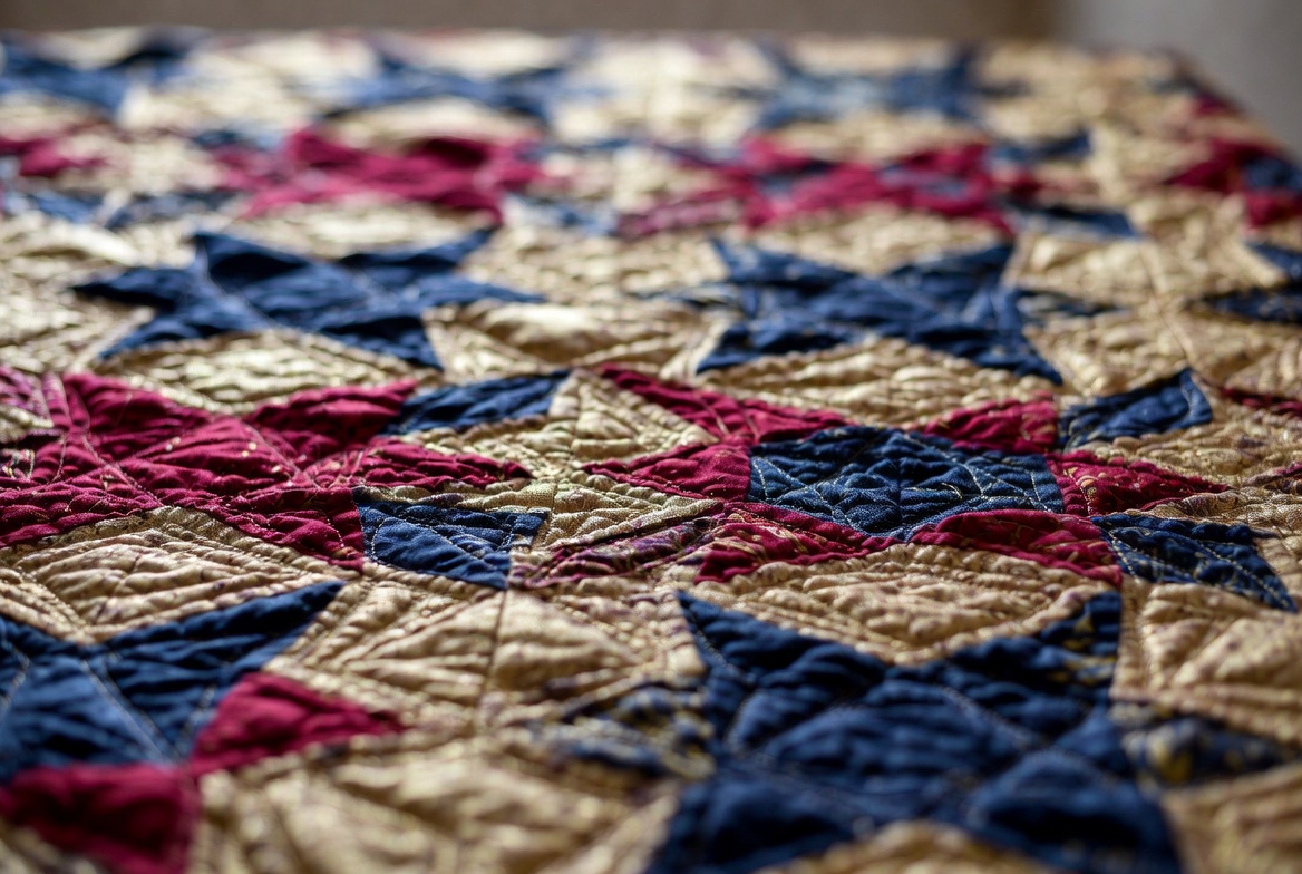 Intricate Star Pattern Quilt in jewel tones